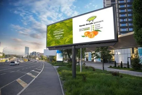 Large outdoor billboard on a city road